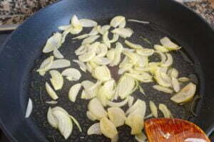 a frying pan with some fried onion