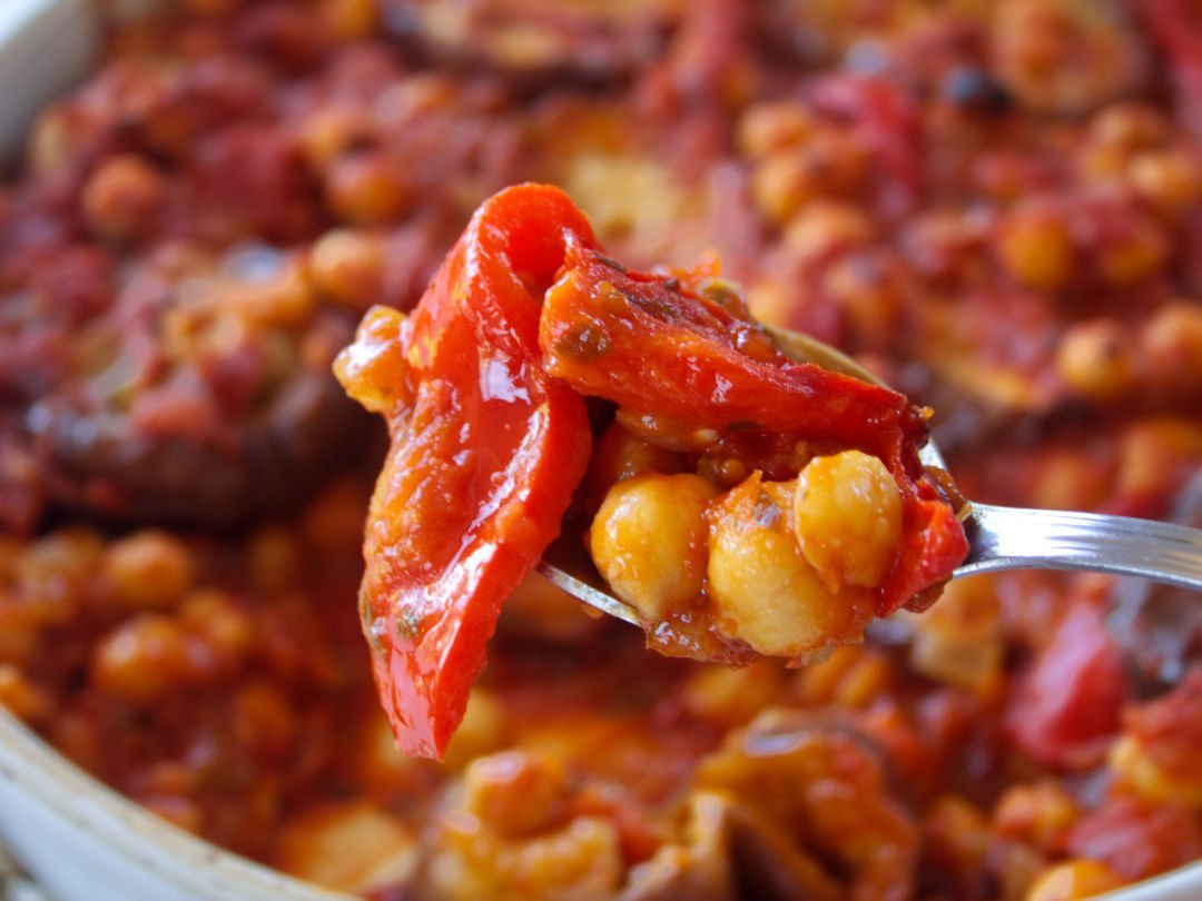 A fork is loaded with Eggplant casserole