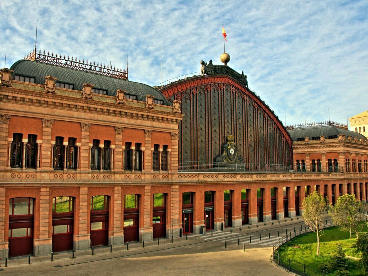 The front facaade of Atocha train station in Madrid