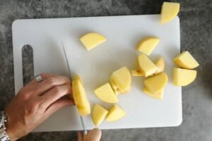 potatoes chopped up into little pieces around an inch in size