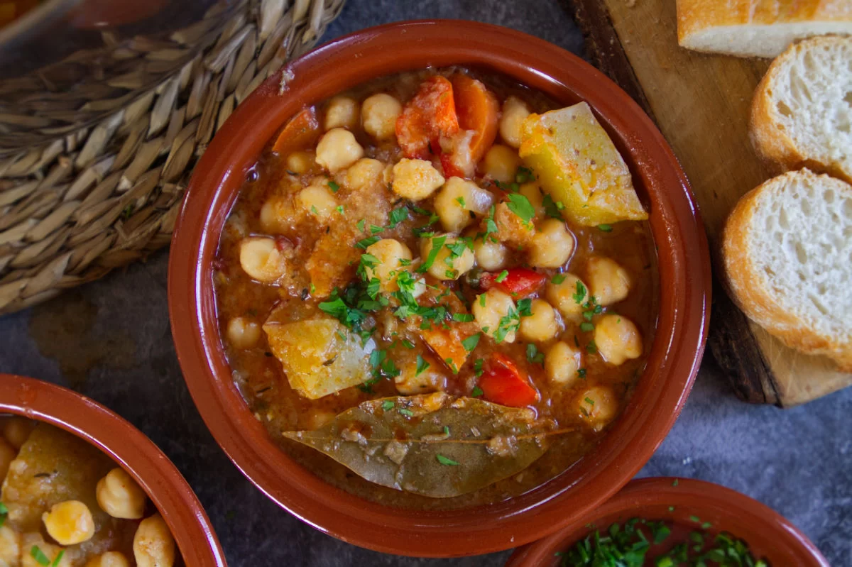 a small earthenware bowl of chickpea stew