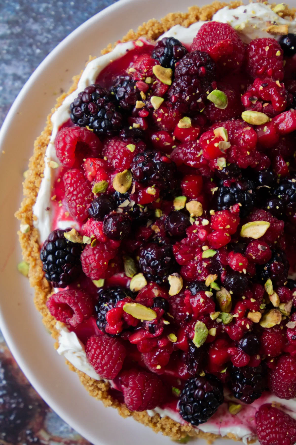 half of a mixed berry cheesecake