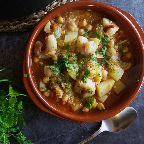 A small cermaic bowl of maravilla fish stew