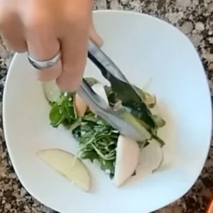 a bowl with some salad.