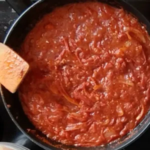 A large pan of simmering sofrito.