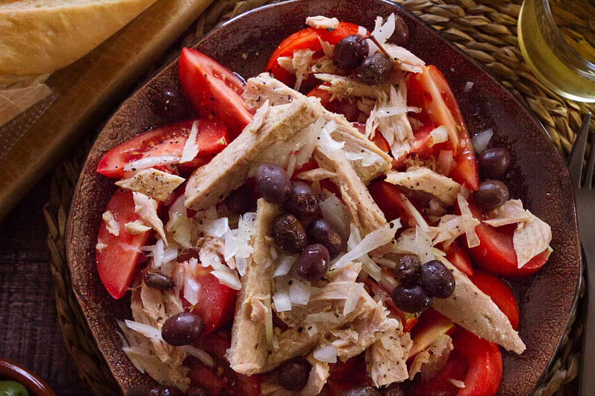 A plate of Spanish-style tuna tomato salad.