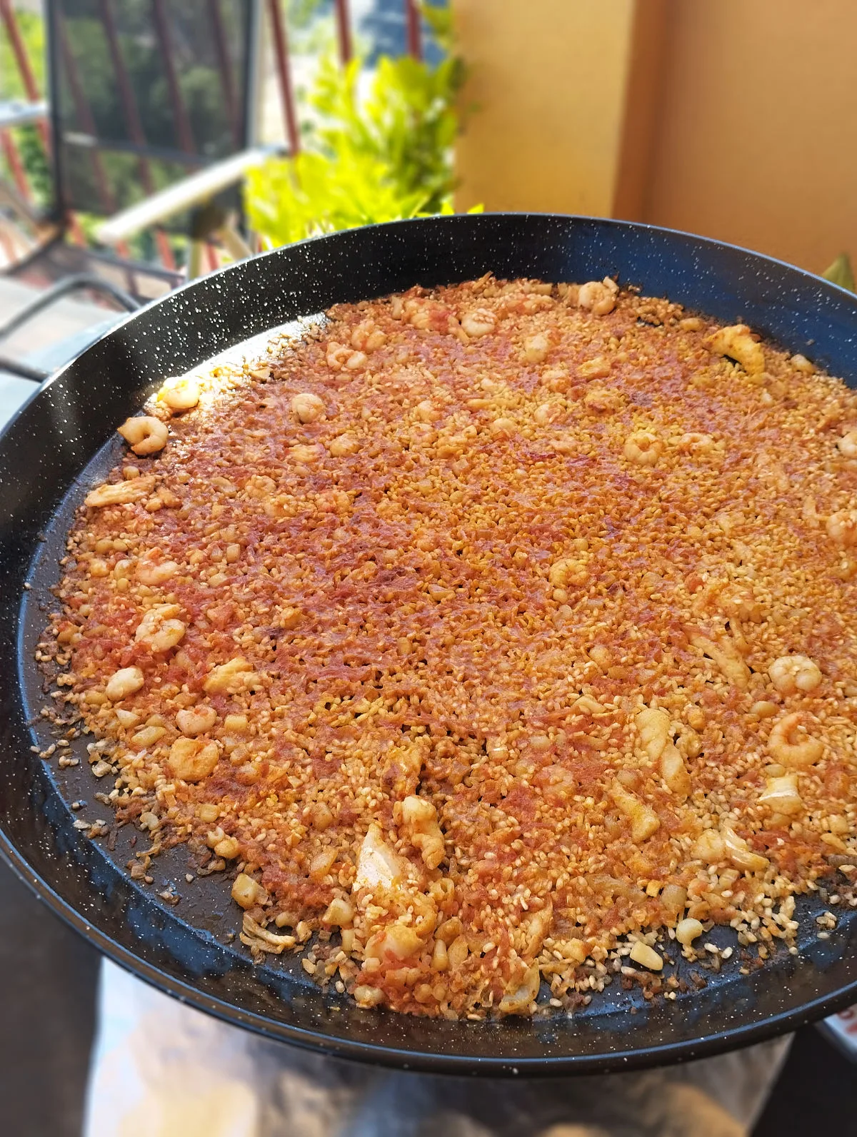 a large paella pan full of Arroz a banda.