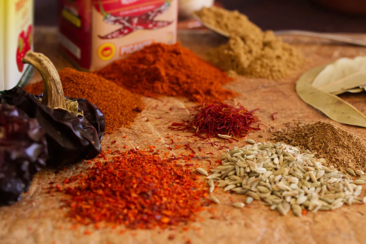 Spanish spices on a chopping board.