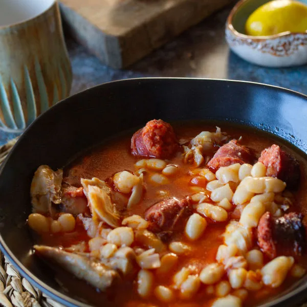 A bowl serving of chicken chorizo dinner.