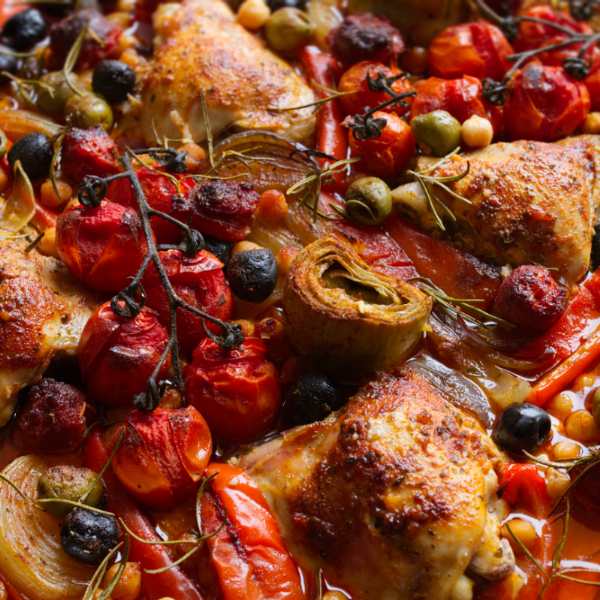 A sheet pan of chicken thighs with chorizo and roasted veg.