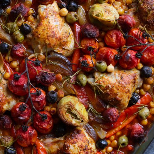 A sheet pan of chicken thighs with chorizo and roasted veg.