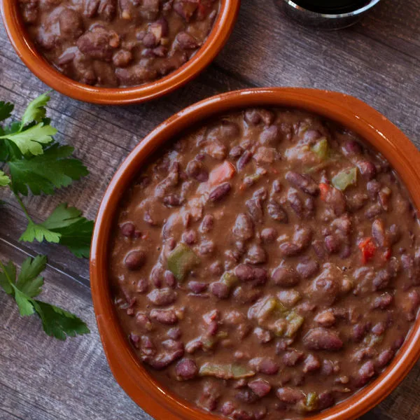 two earthware dishes full of Cantabrian bean stew.