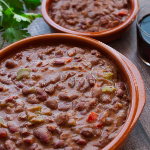 two earthware dishes full of Cantabrian bean stew.