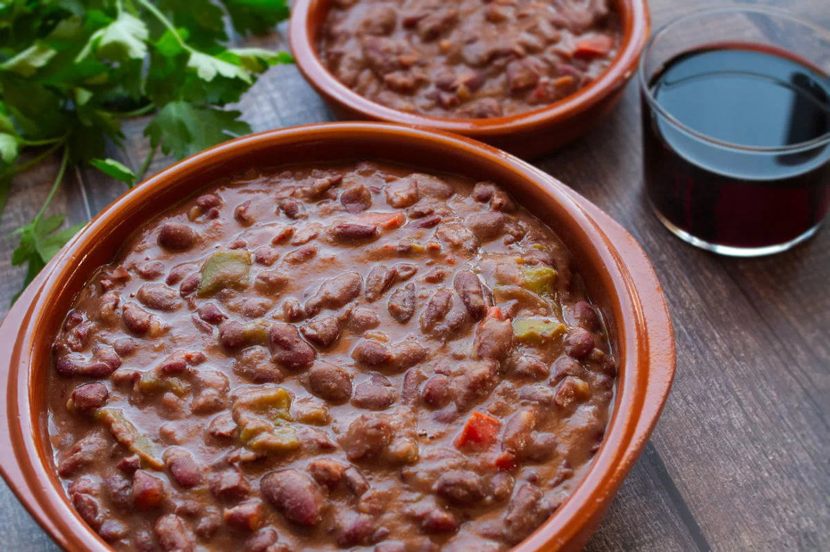 two earthware dishes full of Cantabrian bean stew.