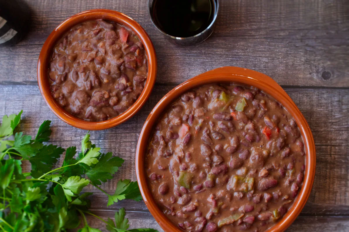 two earthware dishes full of Cantabrian bean stew.