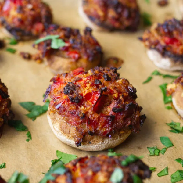 Button mushrooms stuffed with chorizo and garlic.