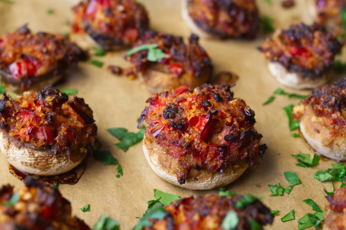 Button mushrooms stuffed with chorizo and garlic.