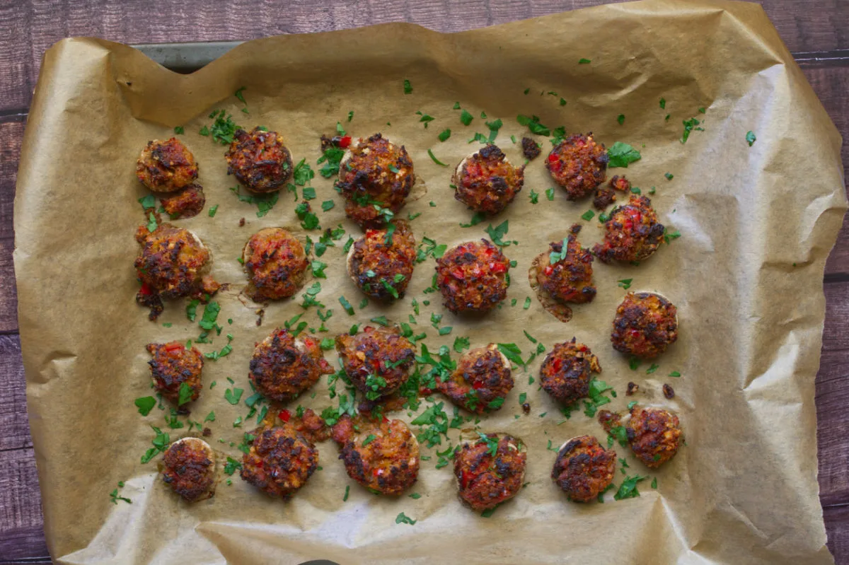 A tray of mushrooms stuffed with chorizo and garlic.