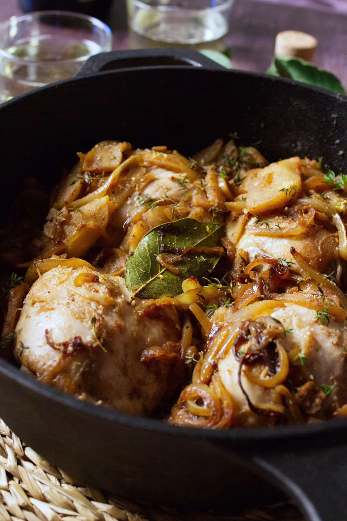 A large pot of one pot chicken thighs in cava and caramelized apples.