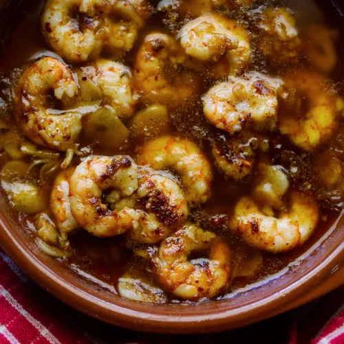 a tapas serving of gambas al pil pil