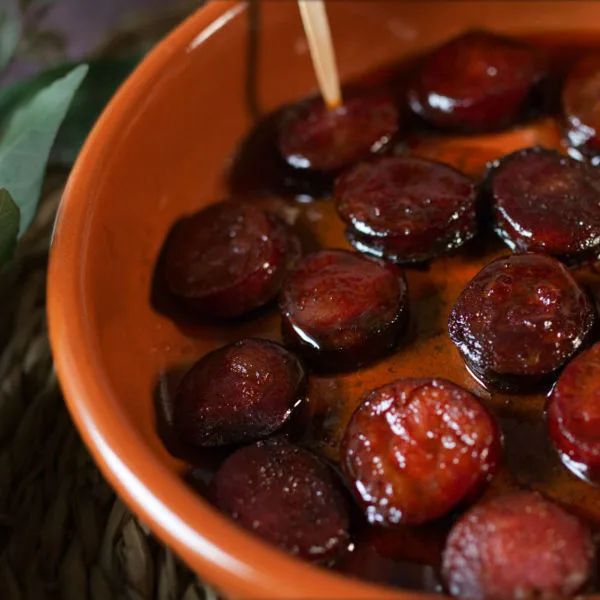 A small tapas serving of chorizo in red wine