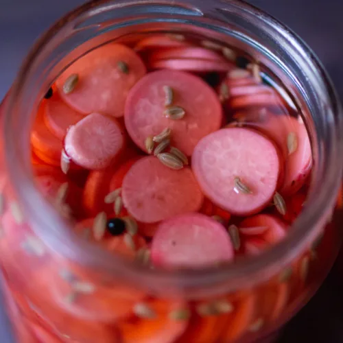 A jar of pickled radishes.